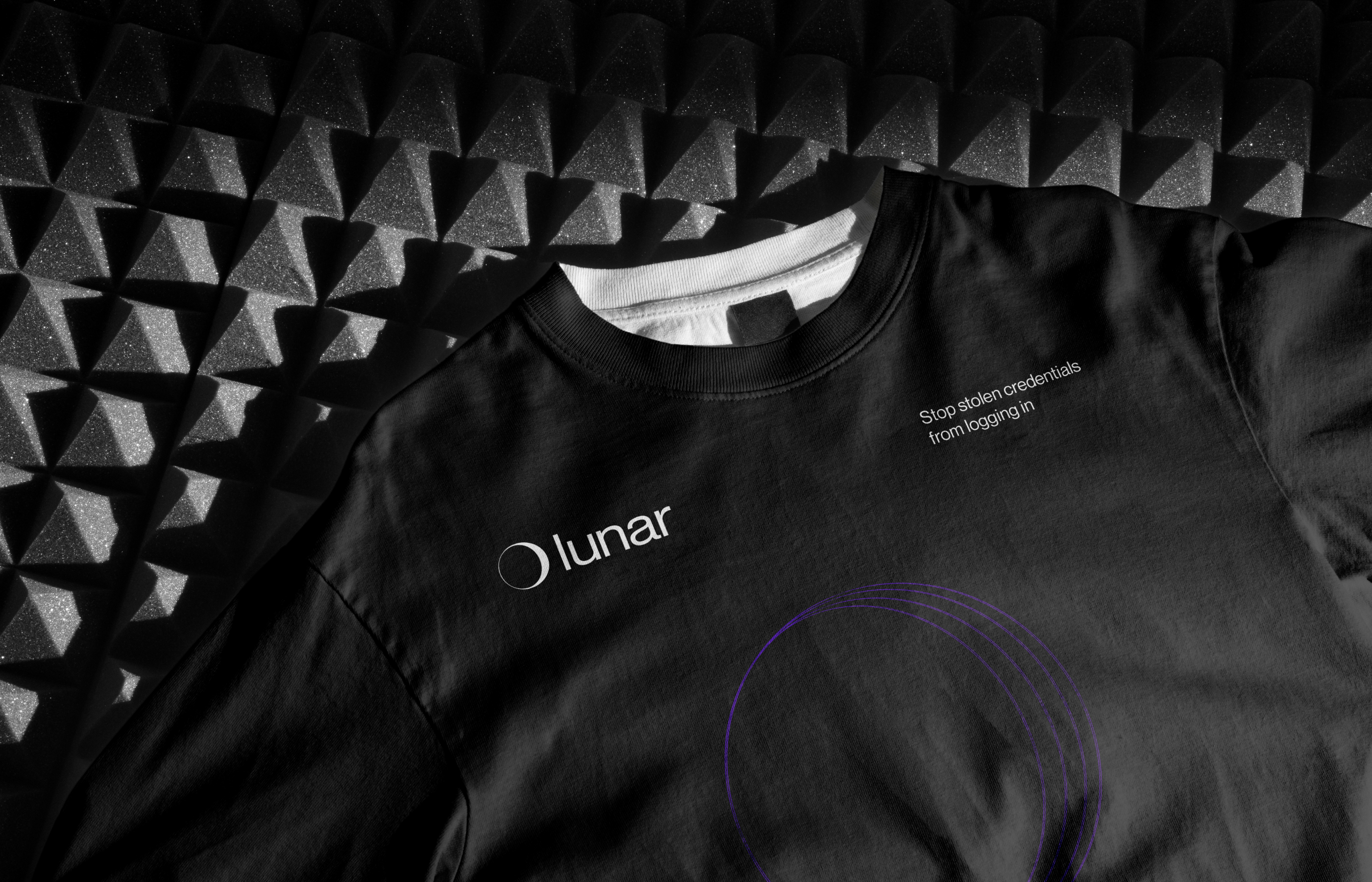 Lunar branded tote bag in a dark studio setting